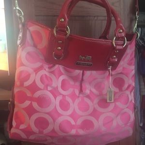 Red and pink Coach purse
